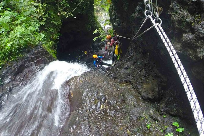 5Hrs Advanced Canyoning (50m) 12 Rappels (Pickup, Lunch & GoPro) - The 50-meter descent beside Aling Waterfall