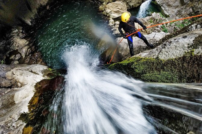5Hrs Advanced Canyoning (50m) 12 Rappels (Pickup, Lunch & GoPro) - The opening jumps, slides, and first rappels