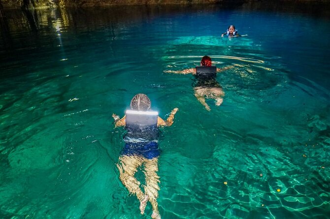 Adrenaline Tour with ATV, Ziplines and Cenote from Cancun - Swimming in a natural cenote
