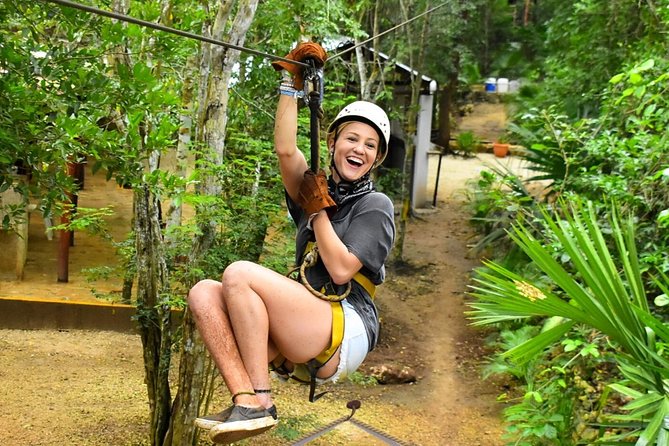 Adrenaline Tour with ATV, Ziplines and Cenote from Cancun - ATV riding on a rough jungle track