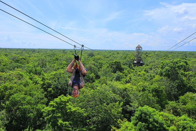 ATV Extreme and Snorkel Adventure from the Riviera Maya - Ziplining above the trees