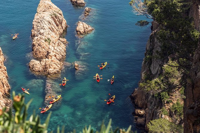 Barcelona Costa Brava Kayak, Snorkel & Cliff Jump Day Tour - Paddling from San Pol beach