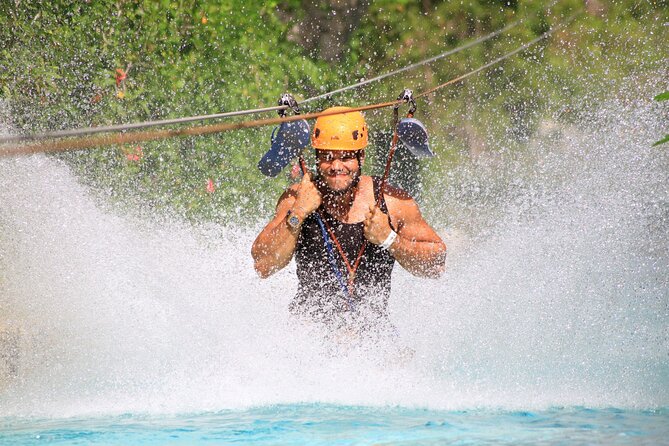 Bavaro Adventure Park Buggy Ride, Zipline Mega Splash, and Waterfall Pool - The Dominican village and Blue Lagoon stop
