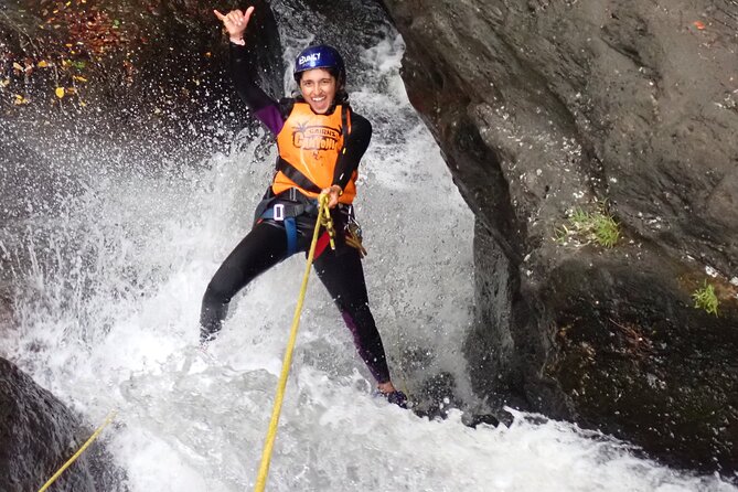 Behana Canyoning Tour by Cairns Waterfalls - The gorge route: climb, slide, jump, and swim