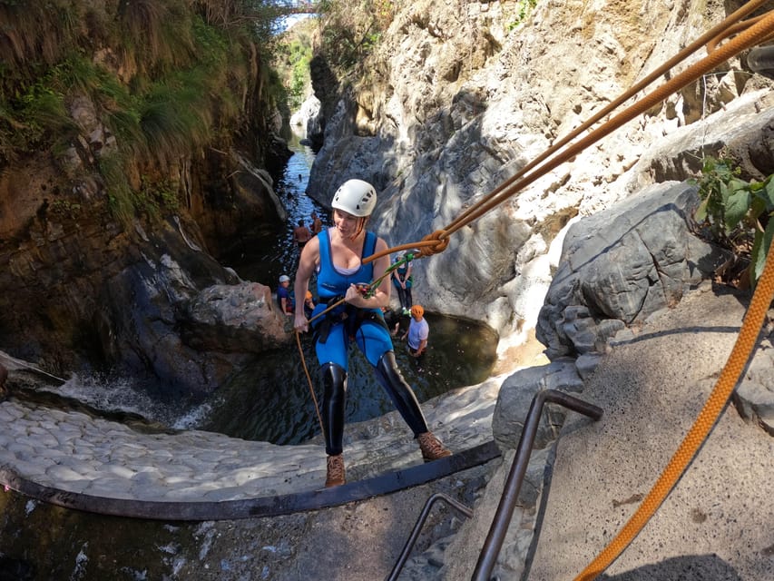 Benahavís: Canyoning Guided Tour at Guadalmina River - Learning to rappel down the rock wall