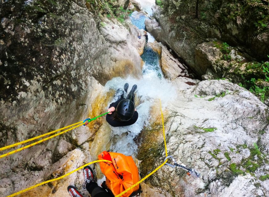 Bovec: 100% Unforgettable Canyoning Adventure + FREE photos - Swimming, jumps, and natural rock slides