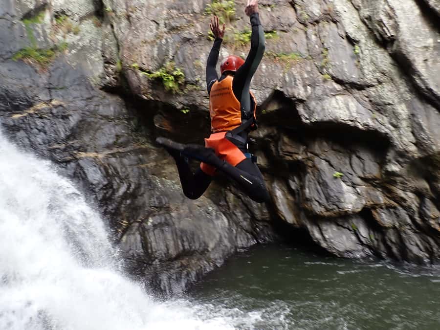Cairns Full-Day Canyoning Adventure tour - Behana Gorge and the large pool after the jump