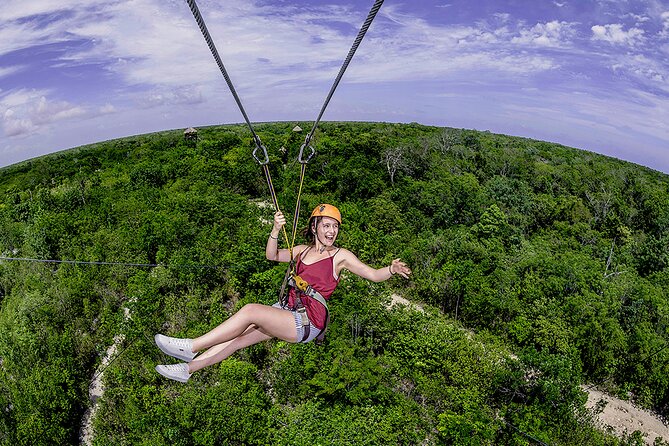 Cancun Cenote Tour: Snorkeling, Rappelling and Ziplining - A 40-foot rappel into Yaxmuul