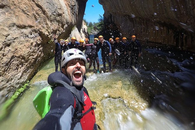 Canyoning Adventure in Madrid National Park with Transport - The 9-meter slide brings a playful finish