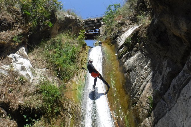 Canyoning at the foot of Etna - Entering a canyon at the foot of Mount Etna