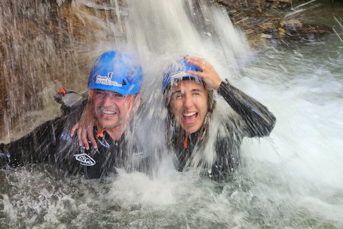 Canyoning experience in Barranco del Gorgo de la Escalera - The 25-meter rappel beside the waterfall