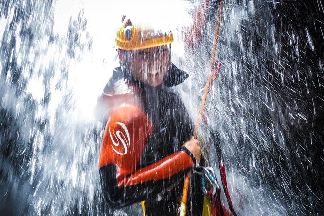 Canyoning Experience in Ribeira dos Caldeirões Sao Miguel -Azores - Rappelling, jumping, and sliding through the canyon