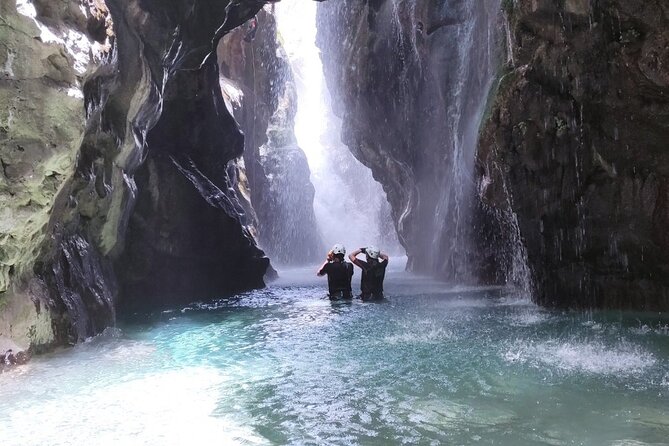 Canyoning in the water - Kourtaliotiko Gorge - Rappelling beside the waterfall