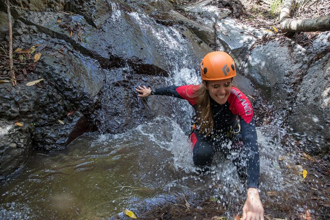Canyoning with Waterfalls in the Rainforest - Small Groups ツ - Getting suited up beside the water