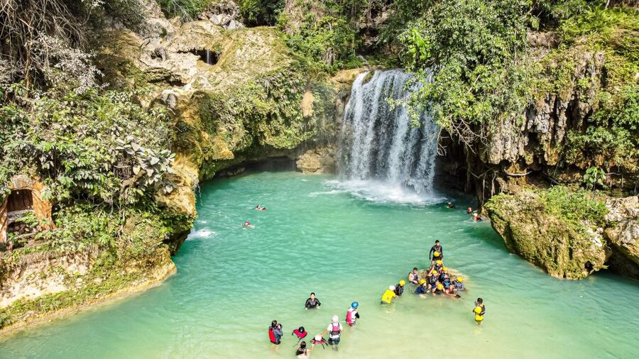 Cebu: Whale Shark Snorkeling & Kawasan Canyoning Tour - Natural slides, jumps, and the optional zip line
