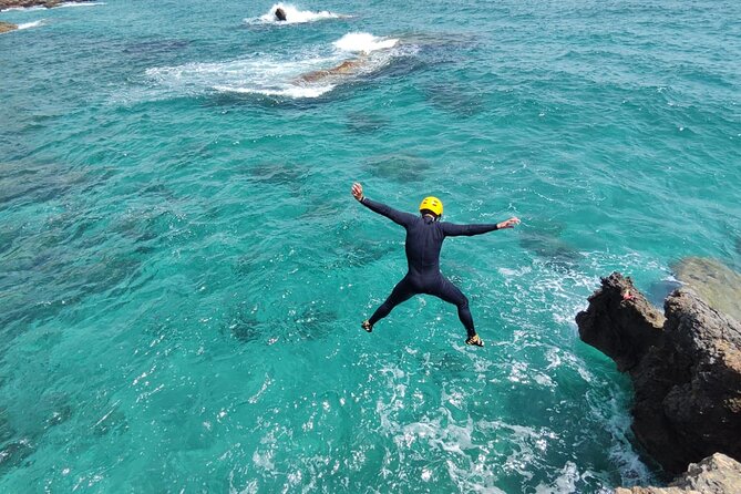 Coasteering Adventure in Ibiza with Guide - Swimming through clear Ibiza water