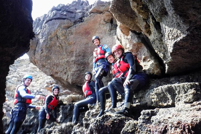 Coasteering and Cliff Jumping Near Lagos - Swimming through caves and along the rocky shore