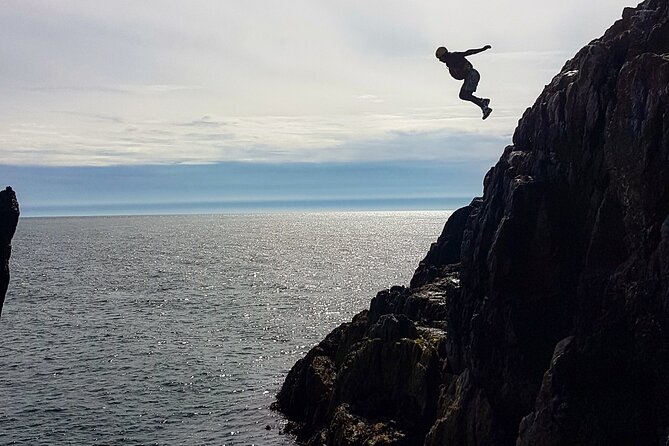 Coasteering (Cliff Jumping, Scrambling, Wild Swimming) on Anglesey - Scrambling from ledges to sea coves