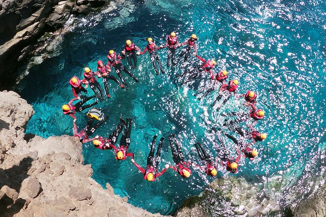 Coasteering Tour - Cliff jumping, swimming, scrambling. - Swimming, snorkeling, and caves add more than a photo stop