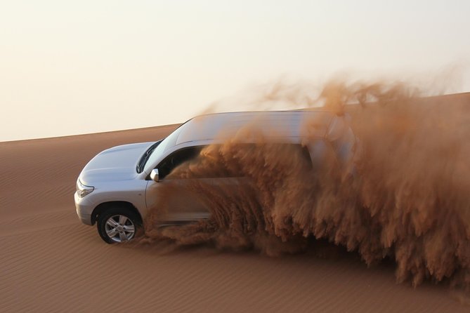 Dubai High Red Dunes Extreme Desert Safari Adventure with BBQ Dinner - Timing, pickup, and cancellation advice