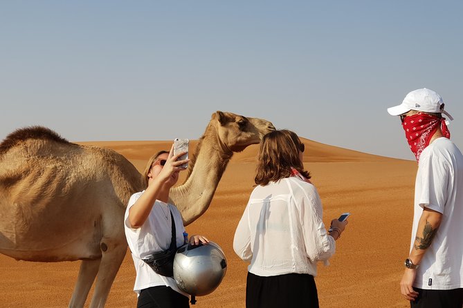 Dubai Red Dune Extreme Desert Safari Adventure With Sand Boarding - What happens after pickup from Dubai
