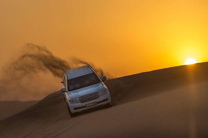 Extreme Desert Safari Evening with Dinner - Tanoura, belly dance, and fire shows