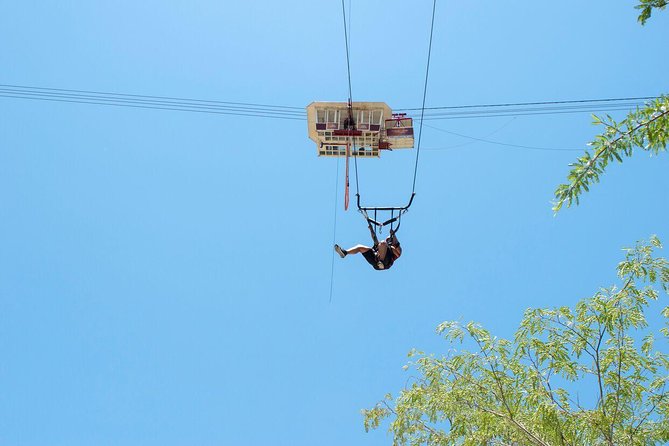 Extreme Swing - Fly from the Glass Bottom Gondola - Free-fall, then a 240-foot pendulum arc