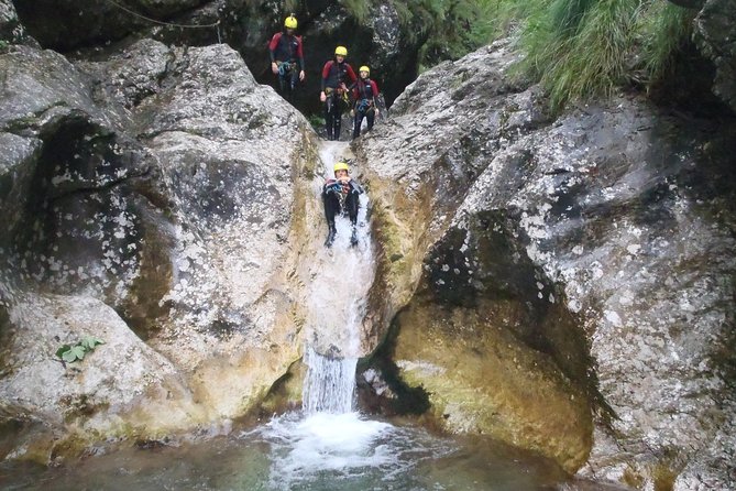 Family Canyoning In Soca Valley - Waterfalls, rock slides, and emerald pools