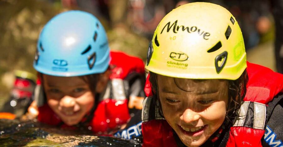 From Arco: Lake Garda Canyoning Experience - Learning to abseil at the canyon exit