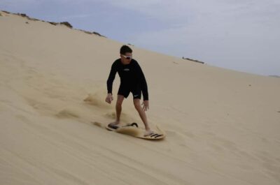Sandboarding Adrenaline down the big Dunes