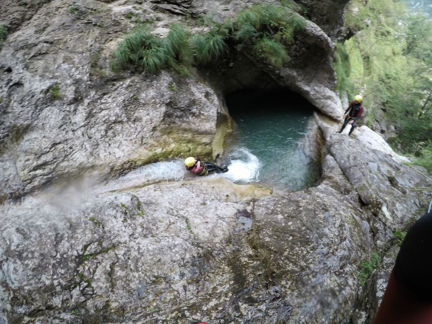 From Bovec: Half-Day Canyoning Tour in Soča Valley - The 8-meter cave slide and 12-meter waterfall