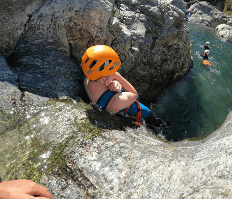 From Estepona: Guadalmina River Guided Canyoning Adventure - Learning to rappel down the 5-meter wall