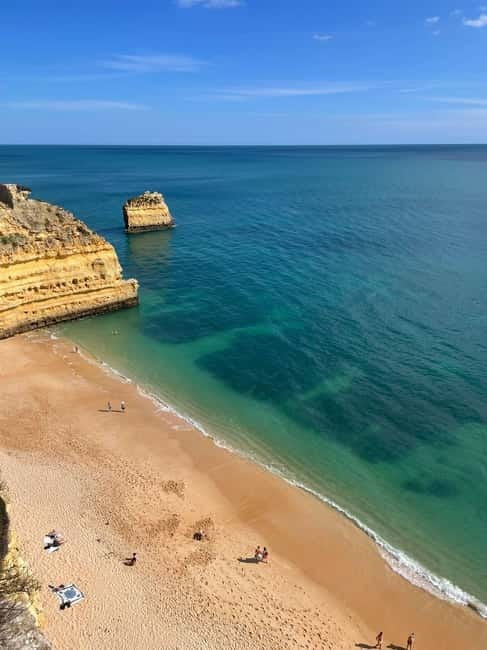 From Faro: Adventure Express Tour - Cliff Jump & Beach - Algar Seco, where walking replaces the boat