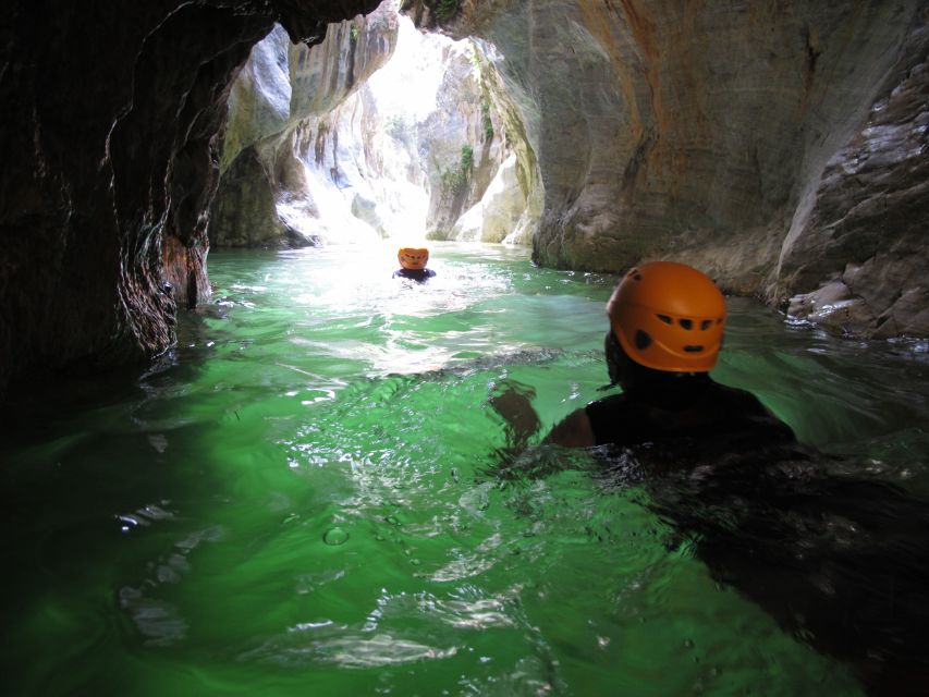 From Marbella: Guadalmina River Guided Canyoning Adventure - Swimming, climbing, and natural slides