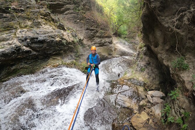 From Marbella: Guided Canyoning Tour in Sima del Diablo - Waterfalls, ropes, and the first abseil