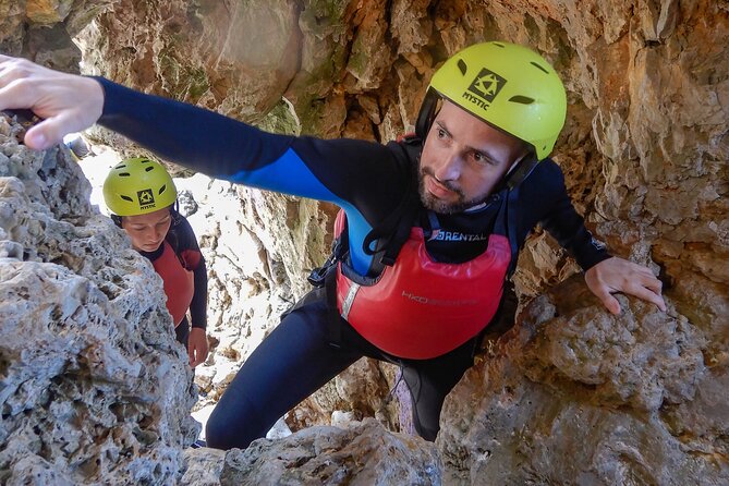 Guided Coasteering Adventure in Pula - Easing into the water at Seagull’s Rocks