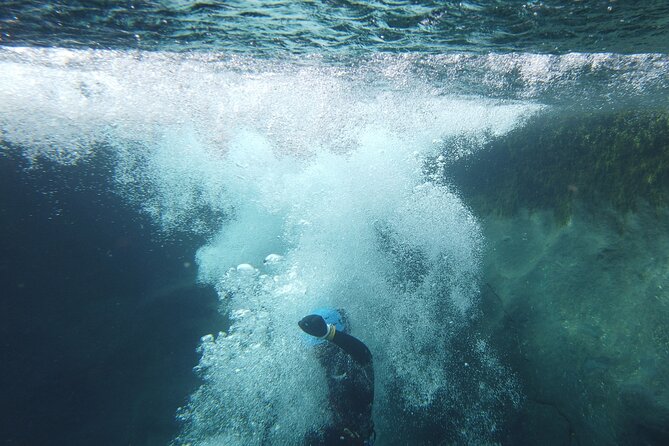Half-day Canyoning under Vatnajökull - Getting suited up in a hooded 5mm wetsuit