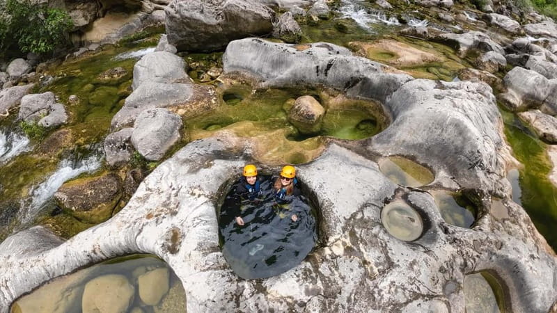 Iz Omisa: Extremni Canyoning na rijeci Cetini/ Free photos - Three hours of swimming, slides, and tunnels