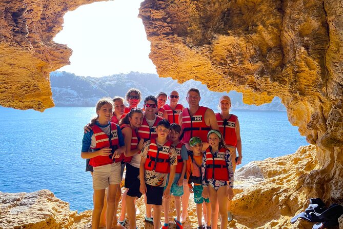 Kayak Paradise: Cala Portixol Snorkel, Cave & Cliff Jumping Tour - Paddling toward Cala el Pom