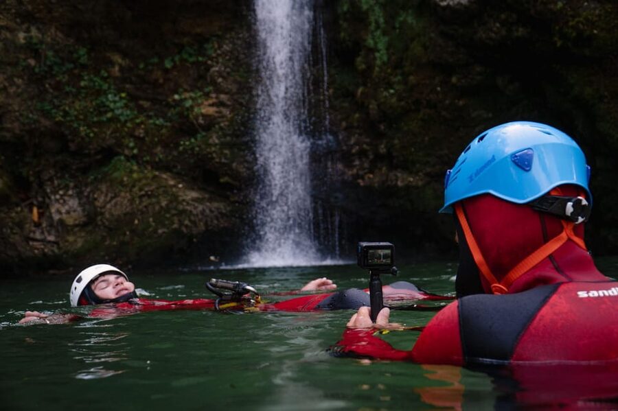 Lake Bled: Canyoning Adventure with Free Footage - Abseiling with a guide close by