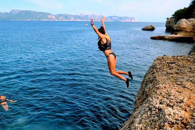 Mallorca: Kayaking, Sea Cave, Cliff Jumping & Snorkel Tour - Swimming, snorkeling, and the optional cliff jump