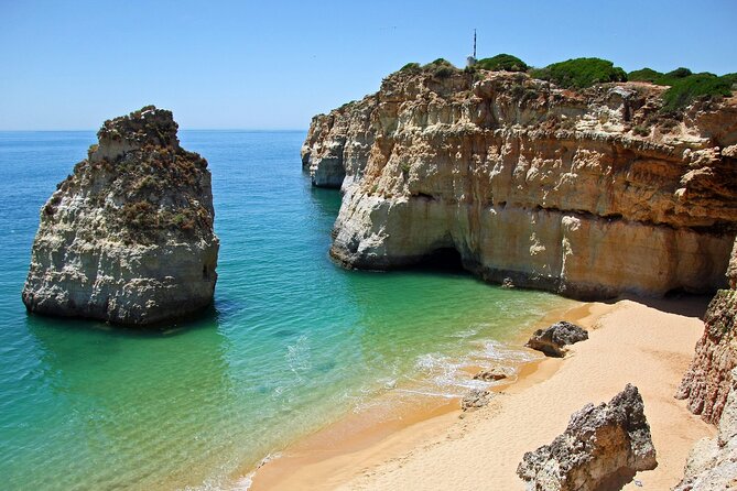 Portimão to Benagil: Adrenaline Wave 90 Minutes Cave Tour - The long coastal run to Benagil