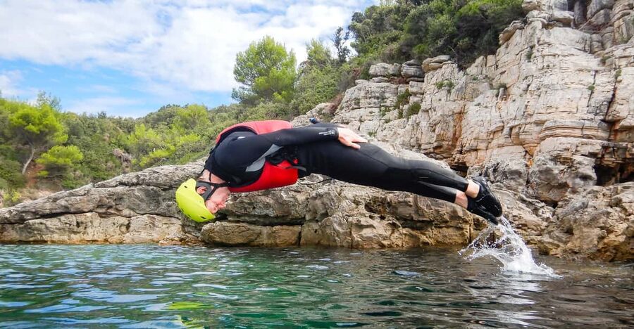 Pula: Coasteering Adventure with Guide and Photos - Sea caves, tunnels, and the small canyon