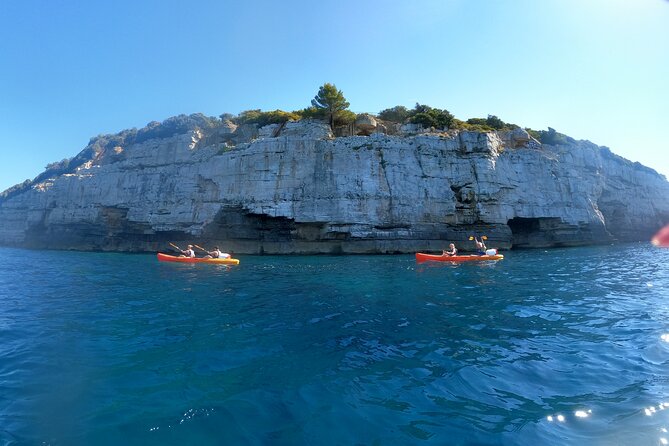 Pula Kayak Tour-Cliff jumping,snorkeling& free GoPro pictures - Guides Denis, Marko, and Max
