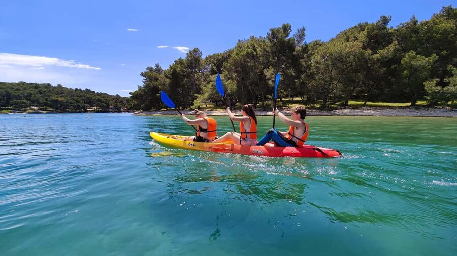 Pula: Muzil Canyon Kayak Tour, Snorkeling and Cliff Jumping - Paddling back to Valovine Beach