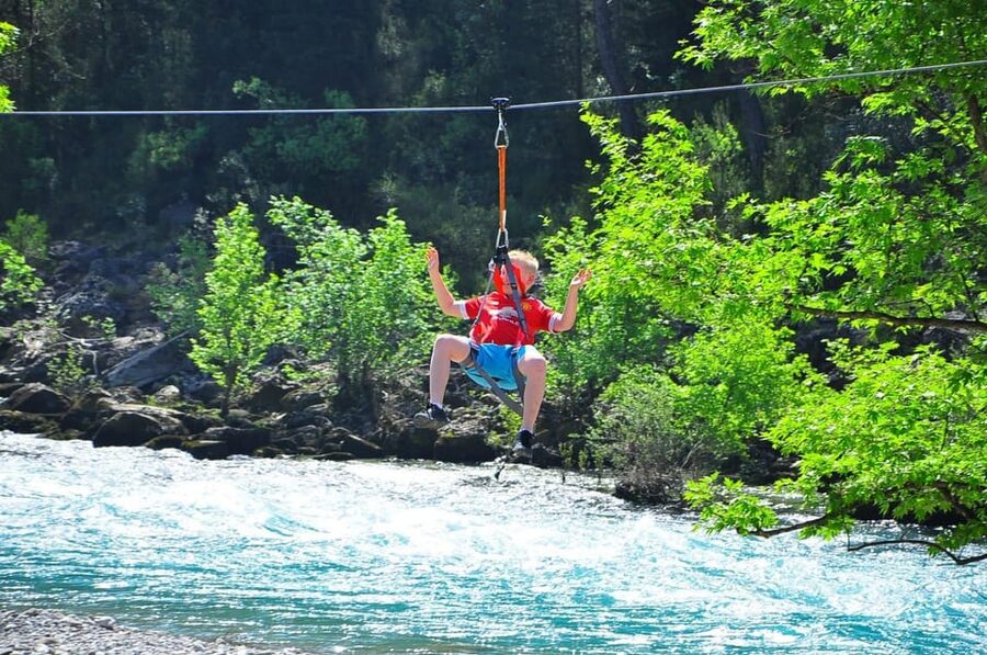 Rafting, Buggy or Quad, Zipline, Canyoning (4 in 1) Tour - Ziplining above the canyon
