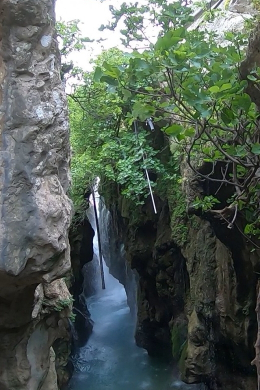 Rethymno: Canyoning Tour in the Kourtaliotiko Gorge - Rappelling beside the Kourtaliotiko waterfall