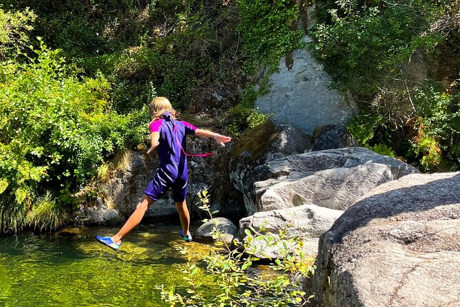 River Trekking/soft canyoning through wild lagoons and Waterfalls - Clear lagoons, waterfalls, and natural slides