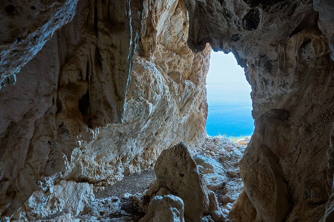 Rock Climbing & Rappelling for the real thrill seekers! - Climbing on shaded rock above the sea