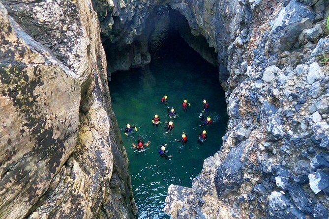 Tenby Coasteering Adventure with expert guides - Swimming, scrambling, and the first jumps